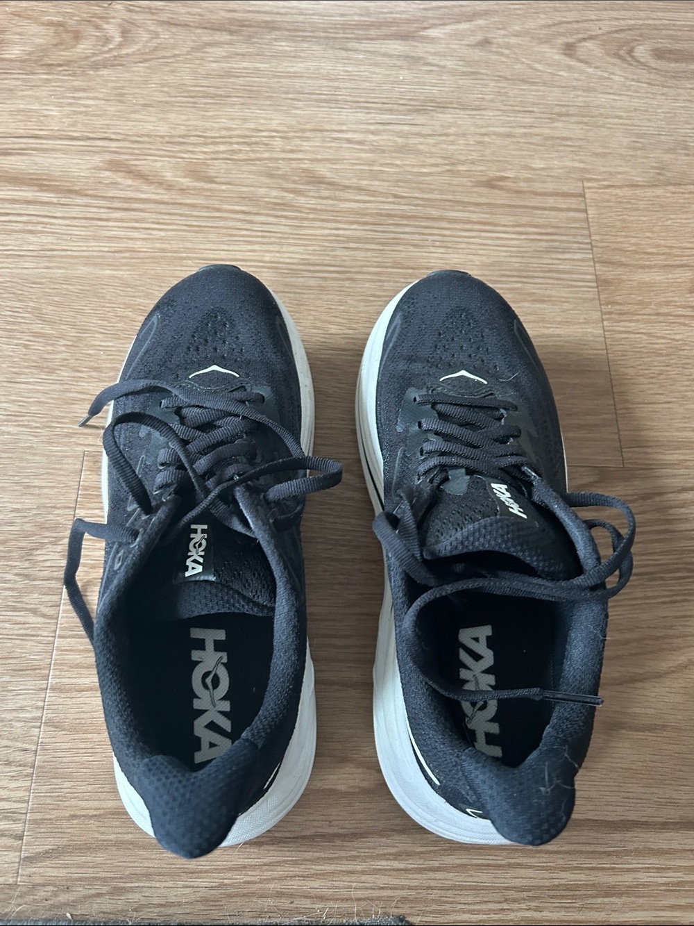 Hoka Women’s Black and White Athletic Running Shoes